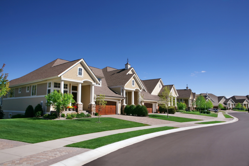 Image of houses along street in residential neighborhood.